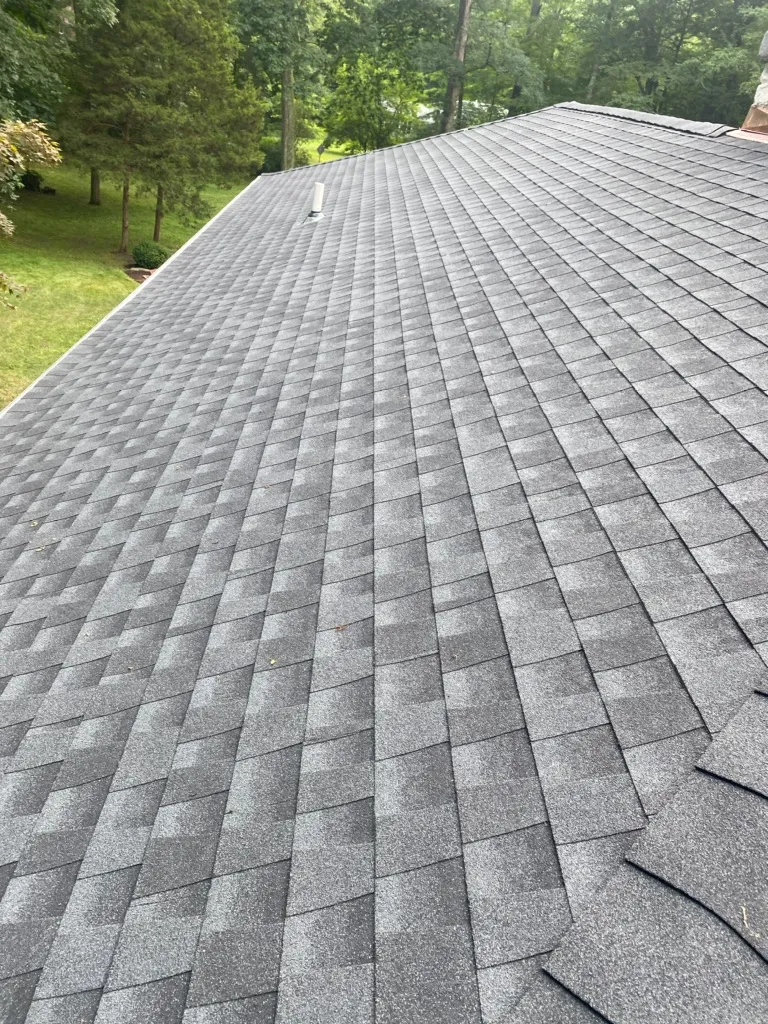 Close-up of architectural asphalt shingles installed by Apex Roofing